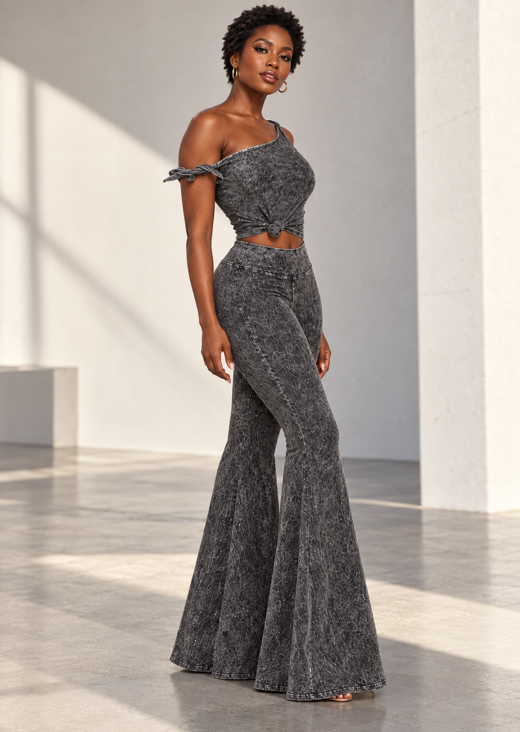 Alternate model angle showing asymmetric neckline and flared silhouette