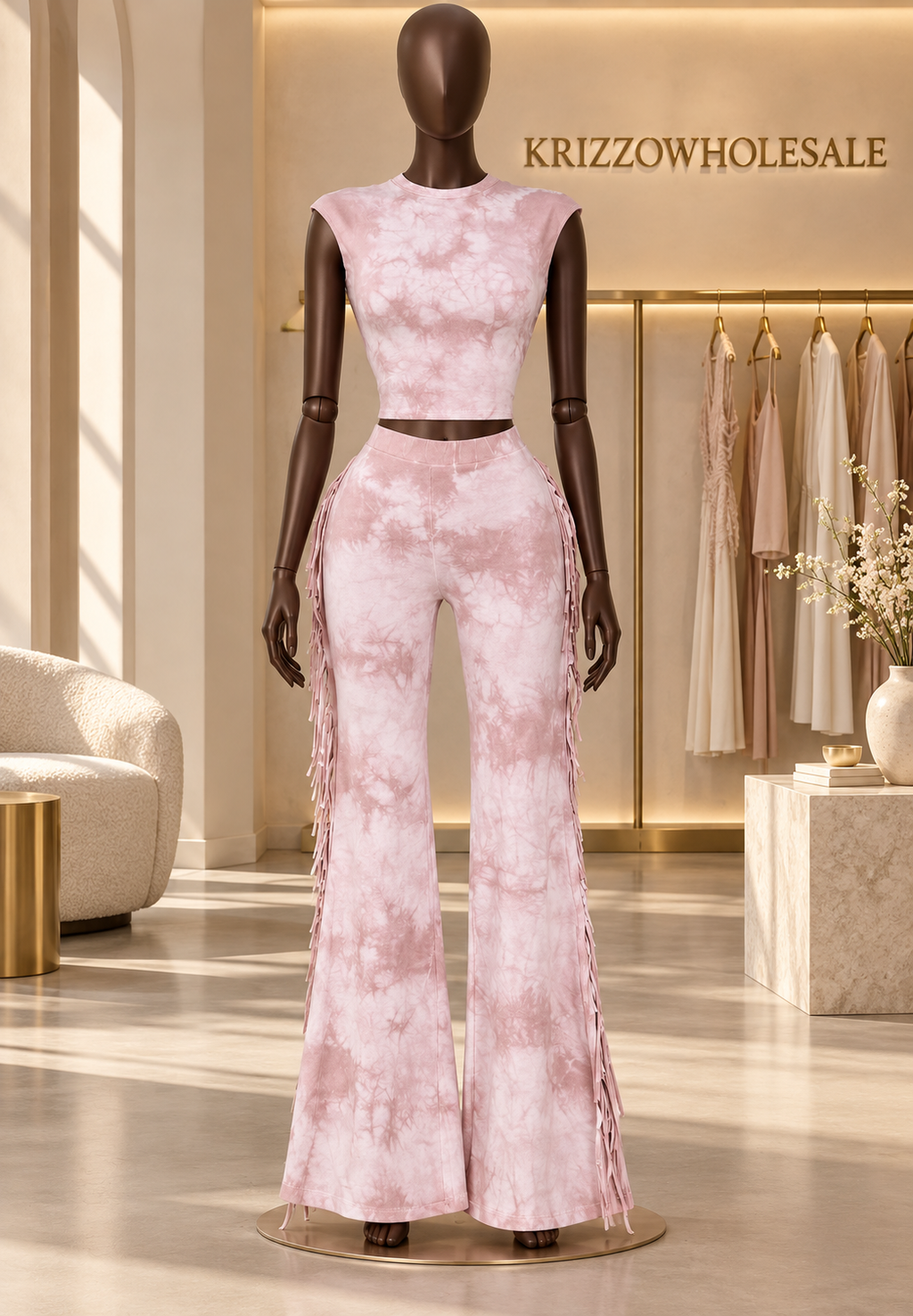 Blush pink tie-dye fringe two-piece set on fashion mannequin in Krizzowholesale showroom