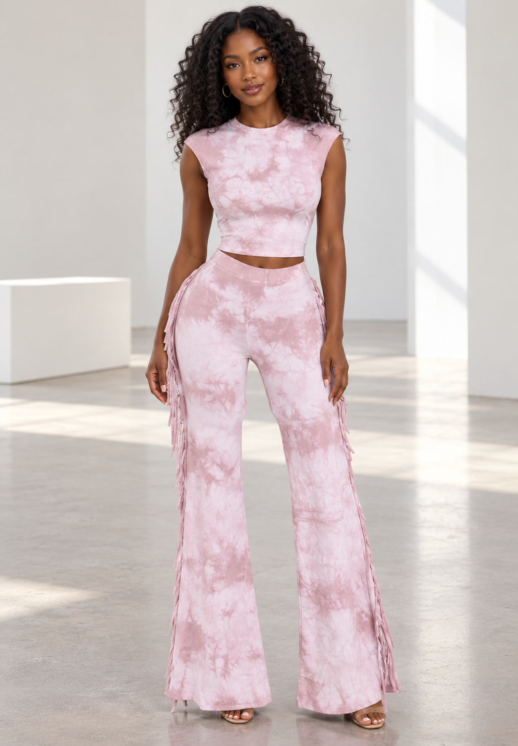 Blush pink tie-dye set on model, front view showing side fringe