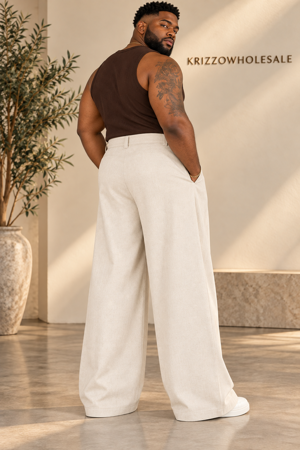 Apricot pants rear view on fuller Black male model