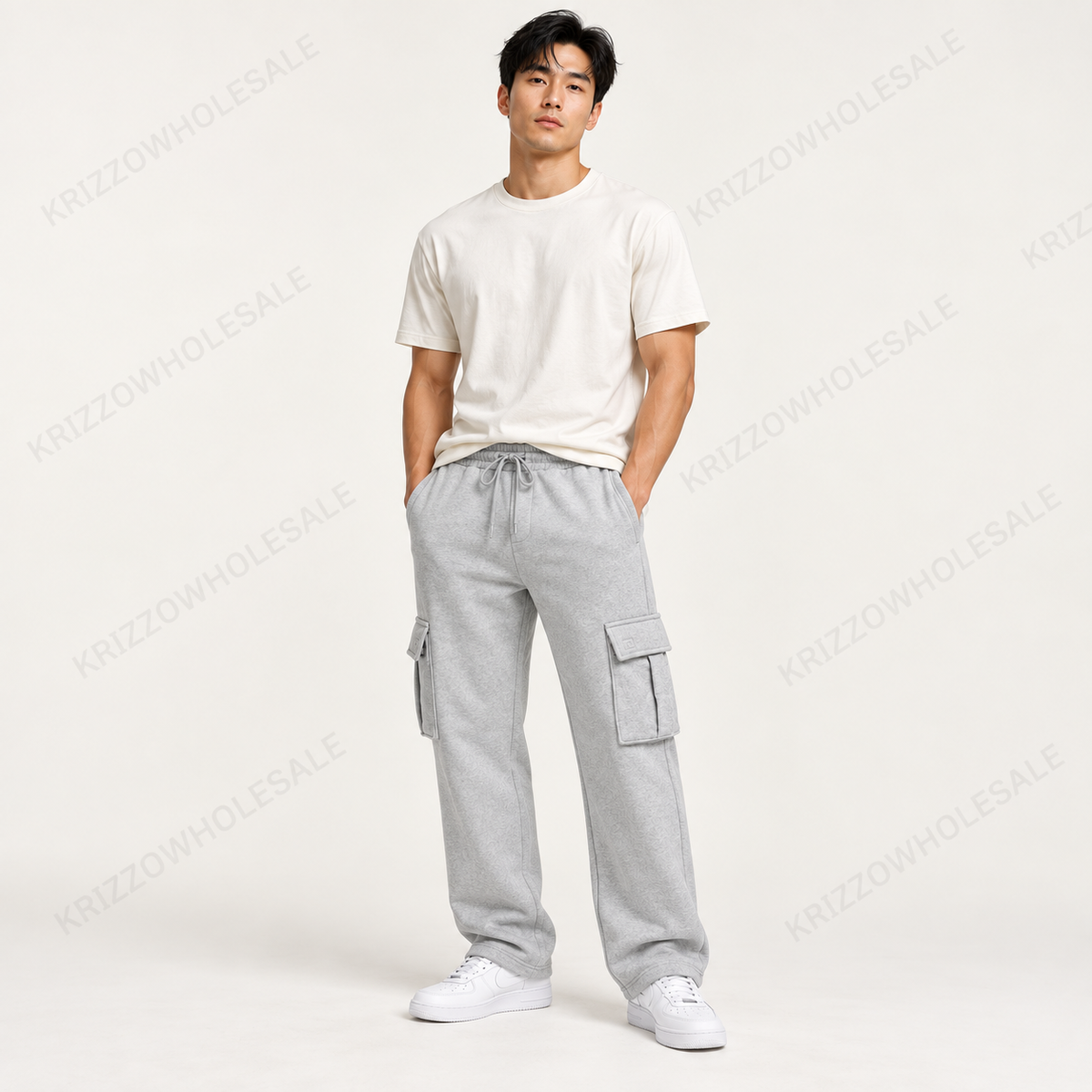 Krizzowholesale men's cargo sweatpants in Light Heather Gray worn by model