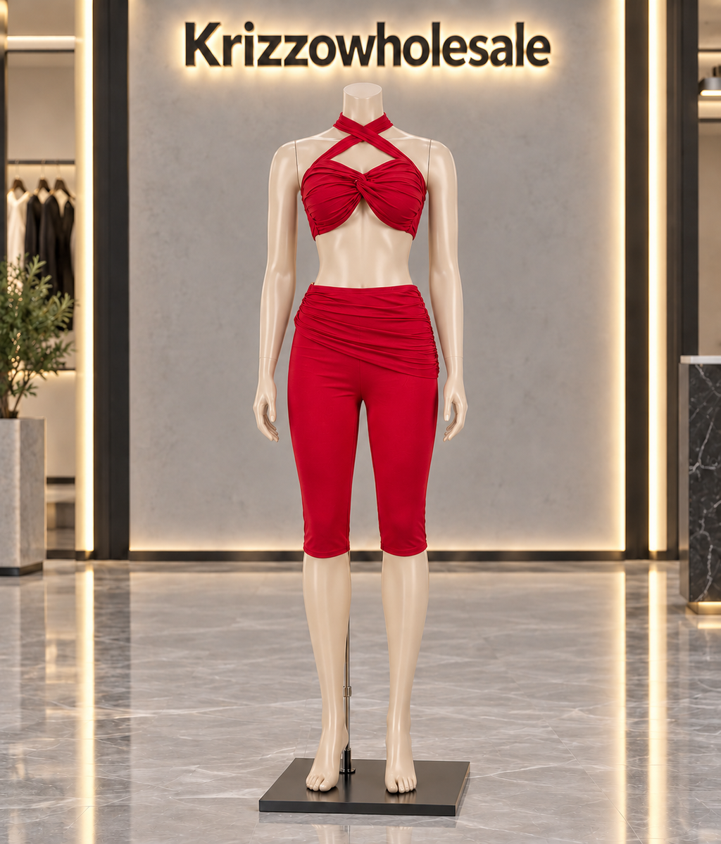 Red halter top and ruched biker shorts set on Krizzowholesale store mannequin