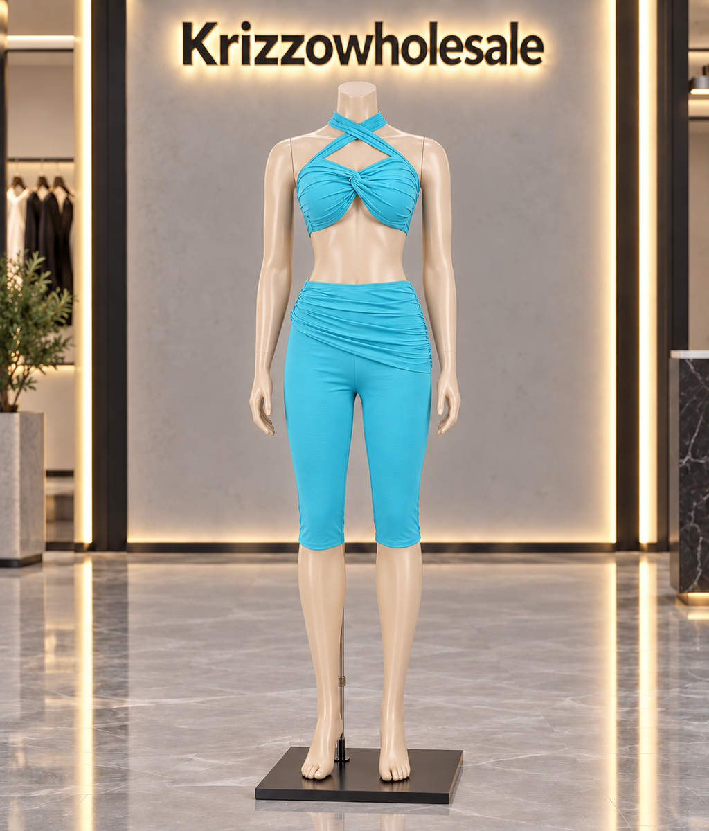 Turquoise halter top and ruched biker shorts set on Krizzowholesale store mannequin
