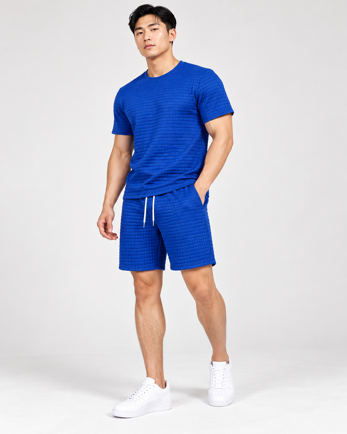Royal blue textured T-shirt and shorts set worn by model