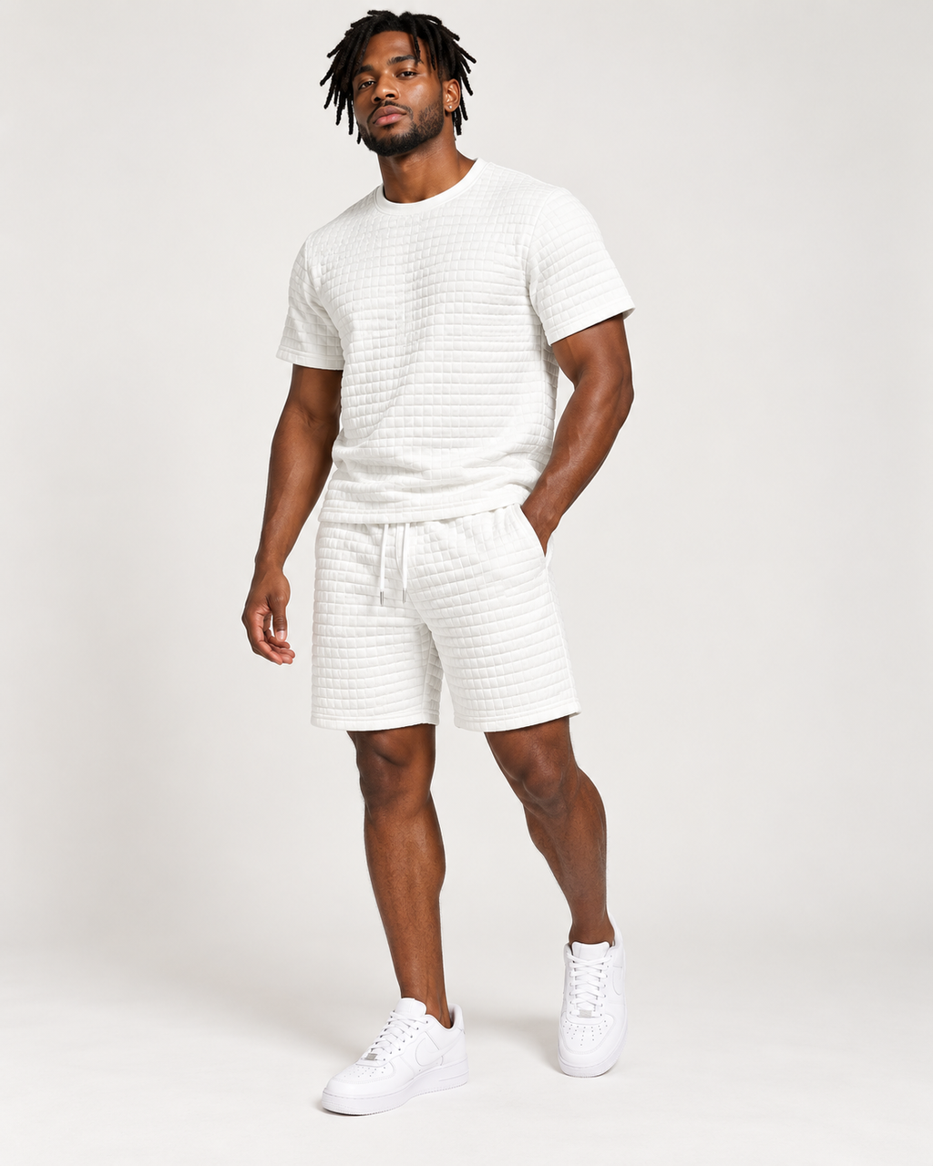 White textured T-shirt and shorts set worn by model