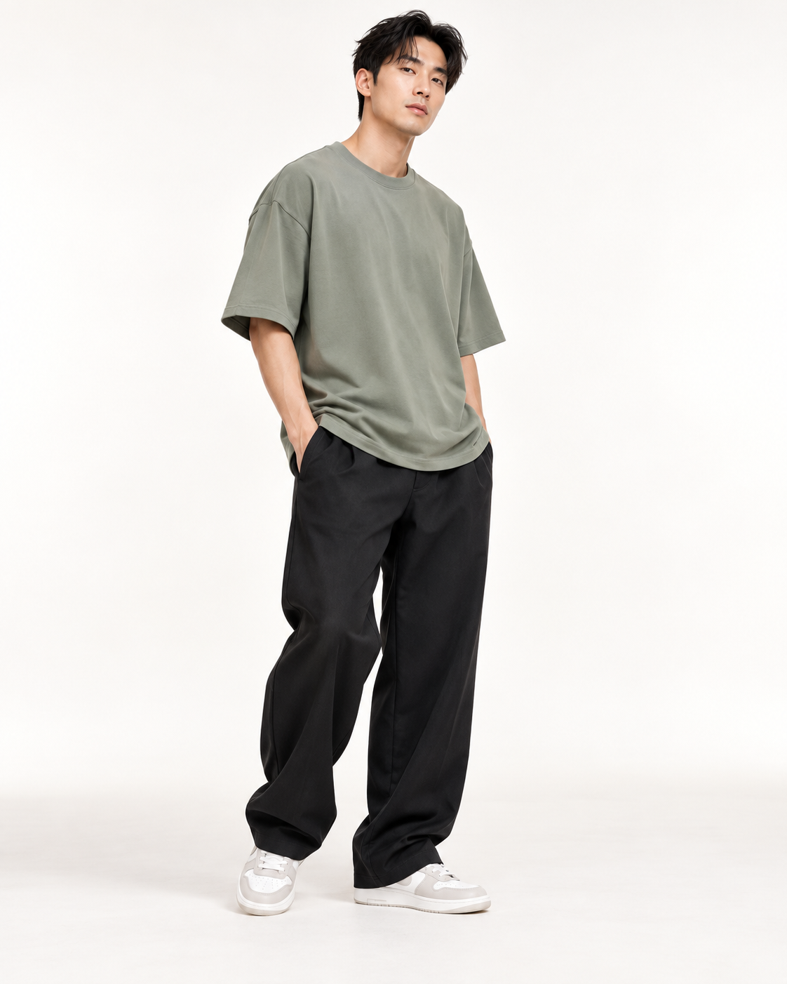 Men's oversized sage T-shirt on model