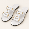 white multistrap sandals on neutral background