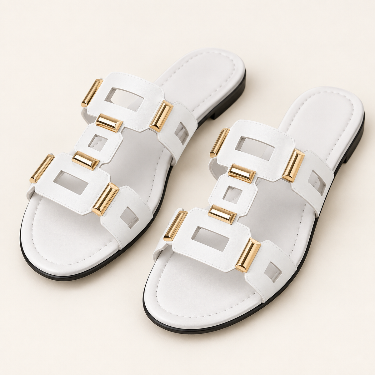 white multistrap sandals on neutral background